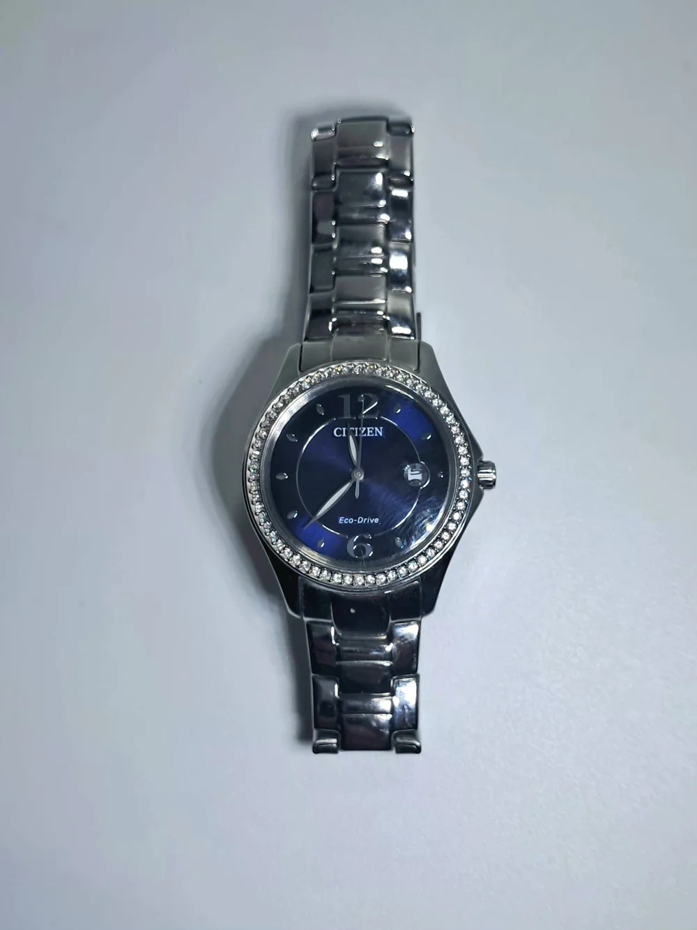Citizen Eco-Drive Silhouette Crystal Ladies Watch Blue Dial Silver Tone FE1140-8